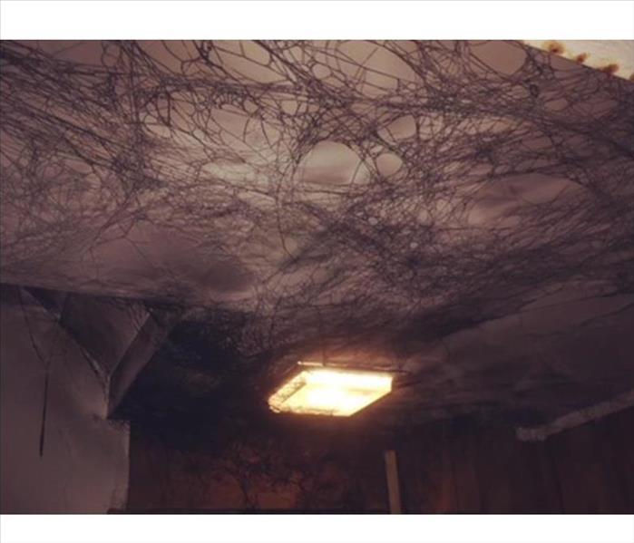 Soot webs on ceiling. Puff back