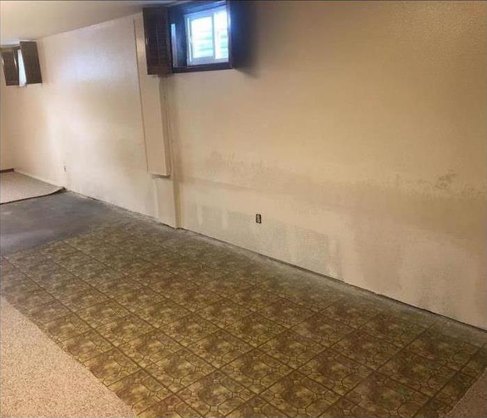 Carpet removed due to an unnoticed leak, caused damage